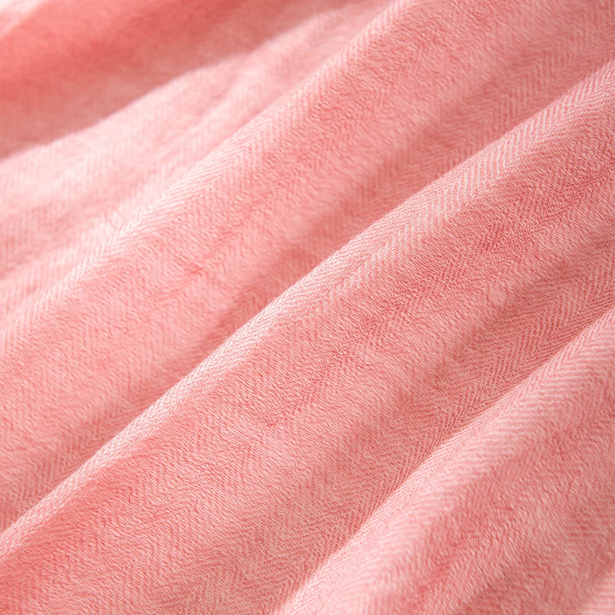 Pink tonal panels revealing subtle diagonal woven texture