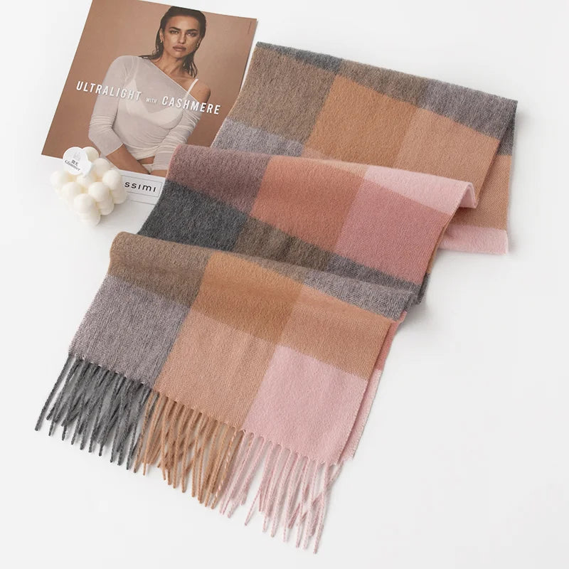 Pink and gray checked scarf showing contrasting fringed ends