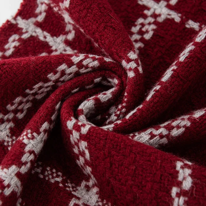 Red and cream chain check fabric arranged in swirl