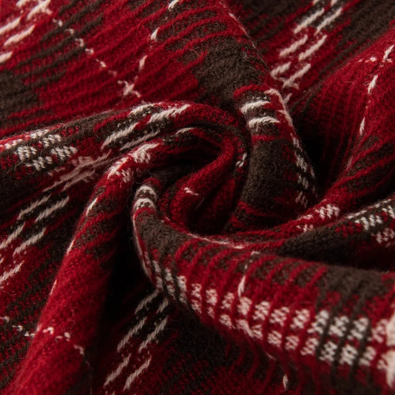 Red dark and cream tartan fabric gathered into swirl