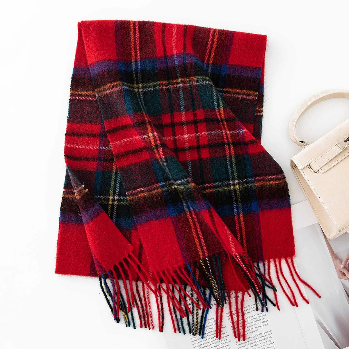 Red tartan wool scarf displaying green blue and yellow lines