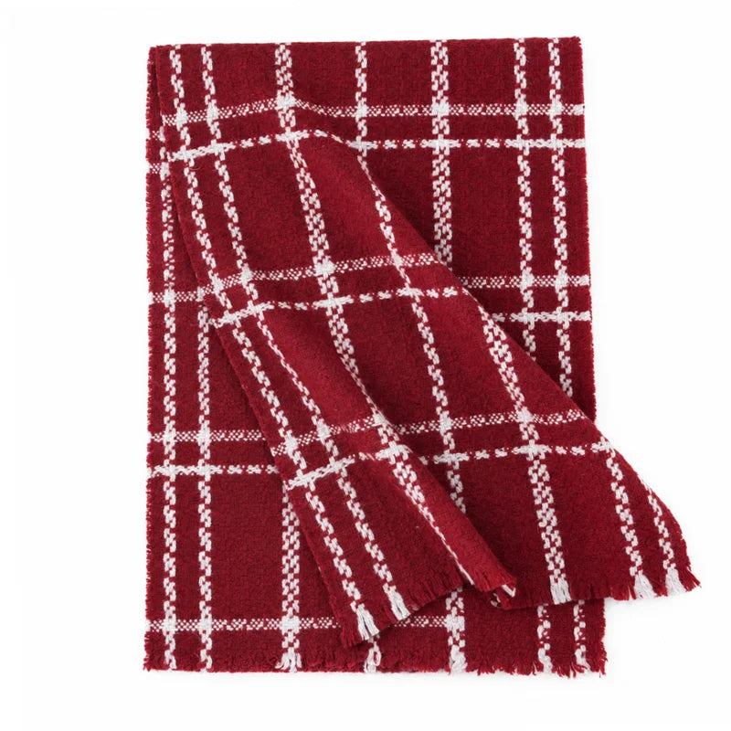 Red wool scarf showing cream chainlike grid and short fringe