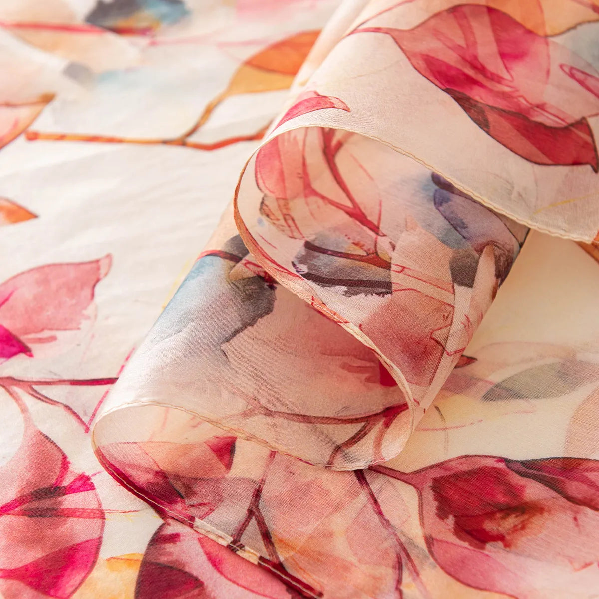 Rolled amber leaf silk scarf close-up