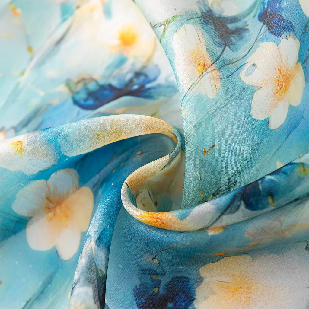 Rolled aqua daisy silk scarf close-up