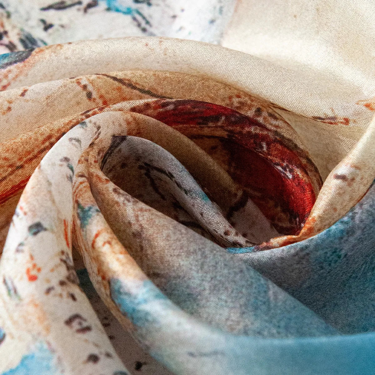 Rolled azure sailboat silk scarf close-up