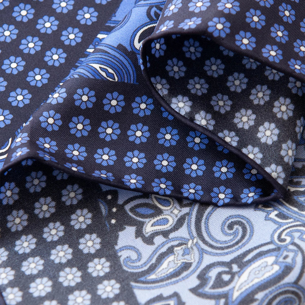 Rolled edge detail of blue paisley Silk Square Scarf