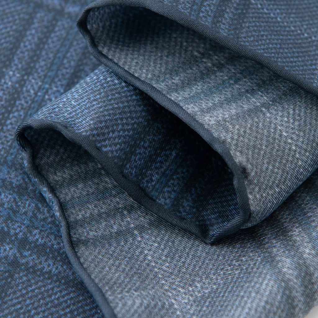 Rolled edge detail of blue plaid Silk Square Scarf