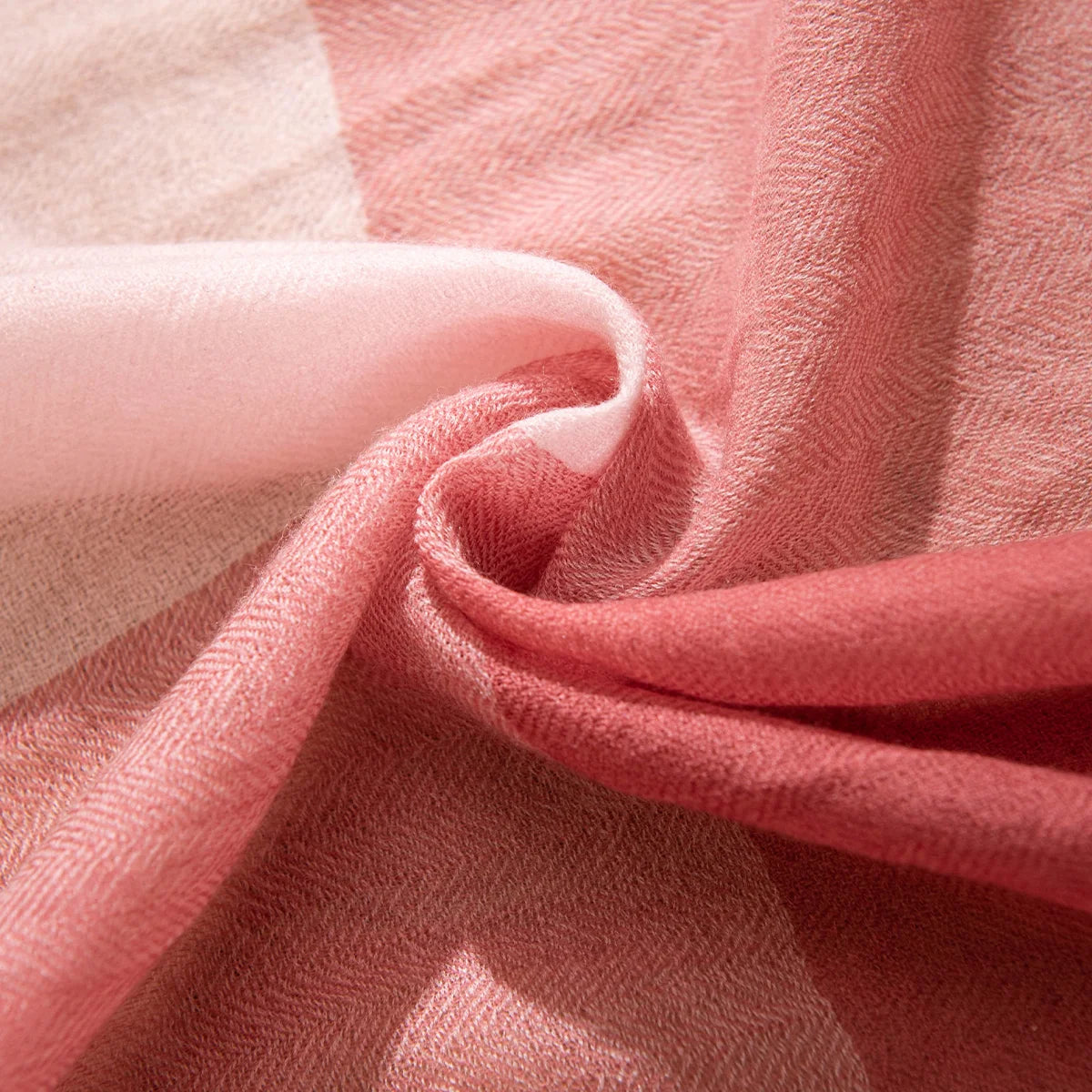 Rose and pale pink fabric gathered in flowing folds