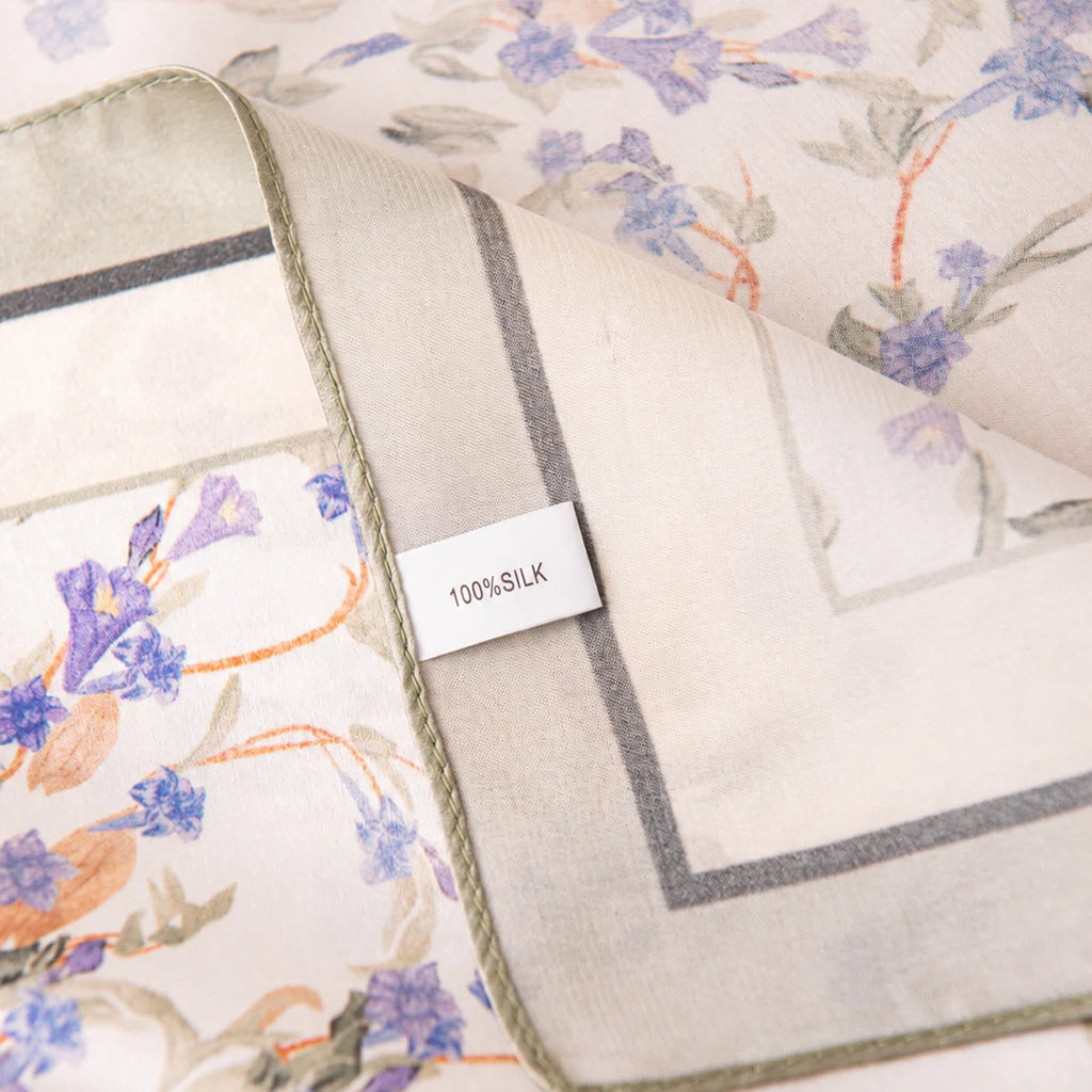Silk Square Scarf label beside lavender floral print