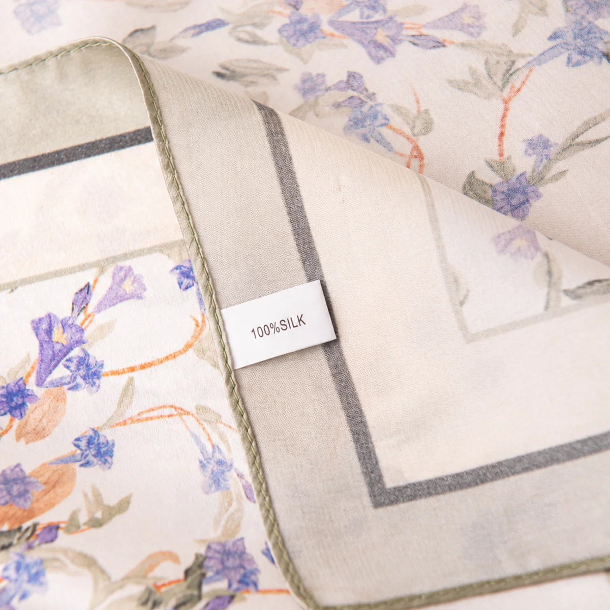 Silk Square Scarf label beside lavender floral print