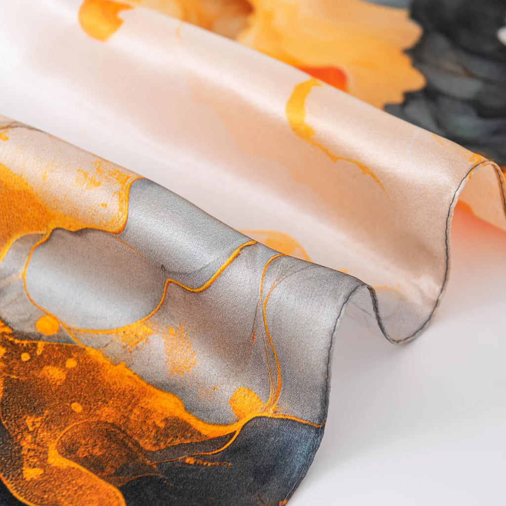 Silk scarf rolled edge detail close-up