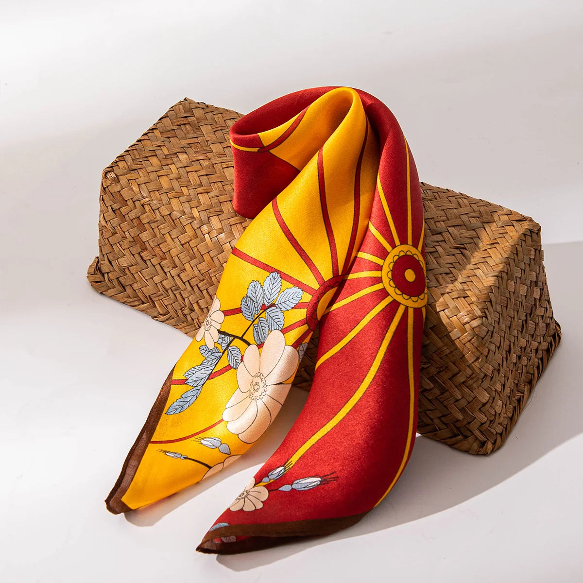 Silk scarf styled on woven box