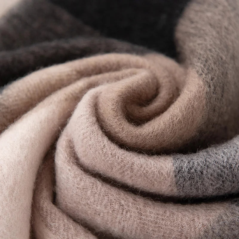 Taupe gray and black fabric arranged in a swirl