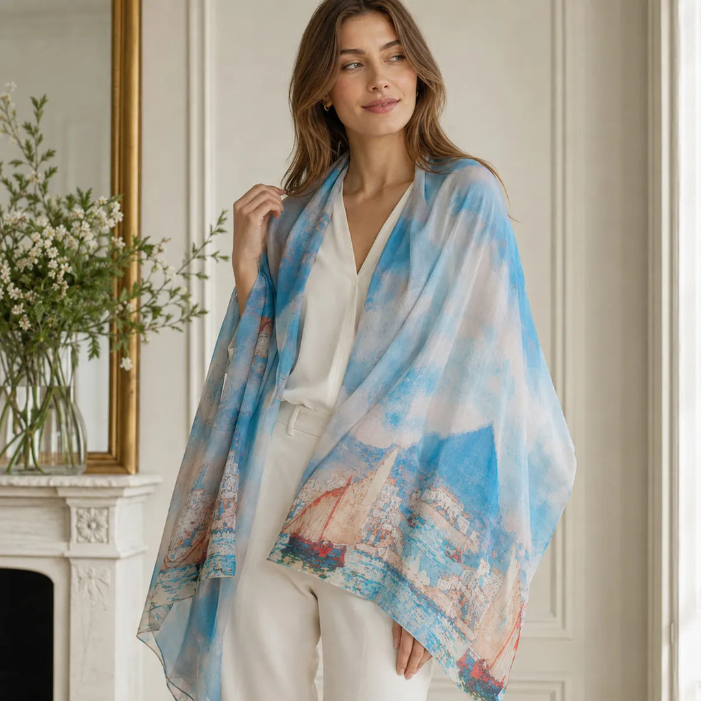 Woman wearing azure sailboat silk shawl indoors