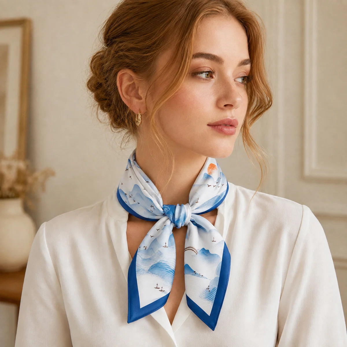 Woman wearing blue landscape Silk Square Scarf necktie