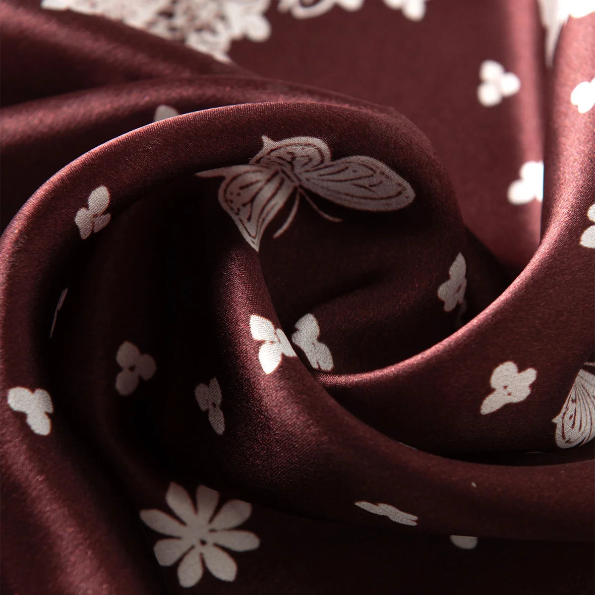 Woman wearing brown butterfly Silk Square Scarf bandana