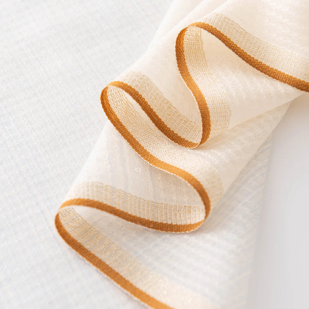 cream blue scarf gold trim detail