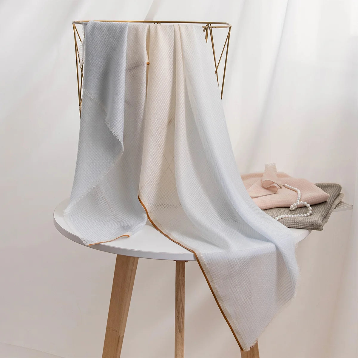 cream blue scarf on chair