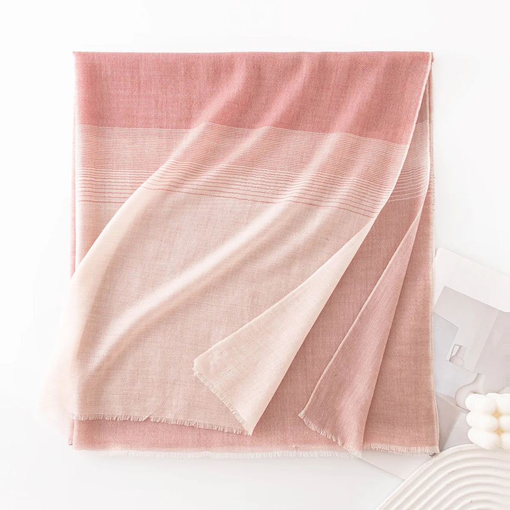 pink striped scarf folded